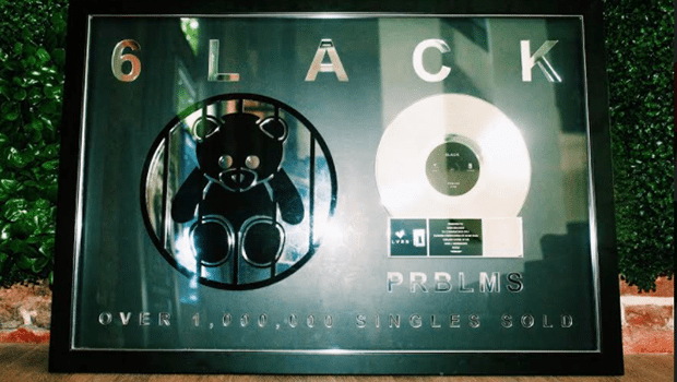 6LACK was presented an award plaque for over 1 million records sold for song, "PRBLMS"
