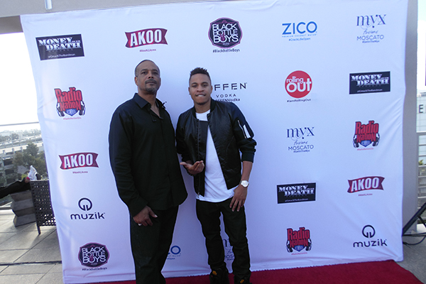 The Hype Magazine Editor-in-Chief Jerry Doby and Actor/Singer/Model Rotimi on the red carpet during Radio Nation DJs #BETX 2015 rooftop day party