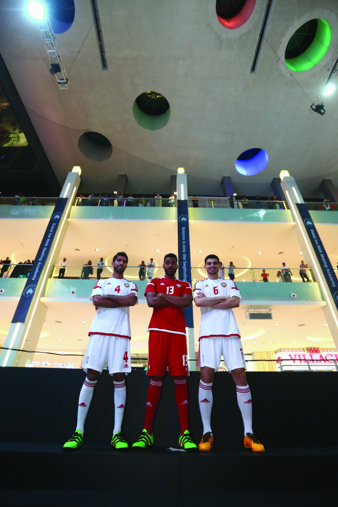 DUBAI, UNITED ARAB EMIRATES - MARCH 12:  Habib Fardan , Khamis Esmaeel and Mohanad Salem of the UAE National Football Team  pose for a picture during the launch of the UAE National team kit at adidas HomeCourt store opening on 12 March 2016 in Dubai, United Arab Emirates.  (Photo by Francois Nel/Getty Images) *** Local Caption *** Habib Fardan; Khamis Esmaeel; Mohanad Salem