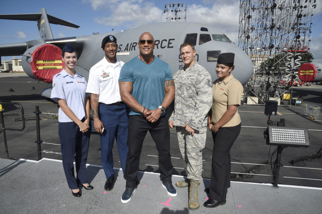 HONOLULU, HI - OCTOBER 22: Dwayne 'The Rock' Johnson (C) at "Spike's Rock the Troops" event held at Joint Base Pearl Harbor - Hickam on October 22, 2016 in Honolulu, Hawaii. "Spike's Rock the Troops" will premiere on December 13 at 9 PM, ET/PT on Spike. (Photo by Kevin Mazur/Getty Images for Spike)