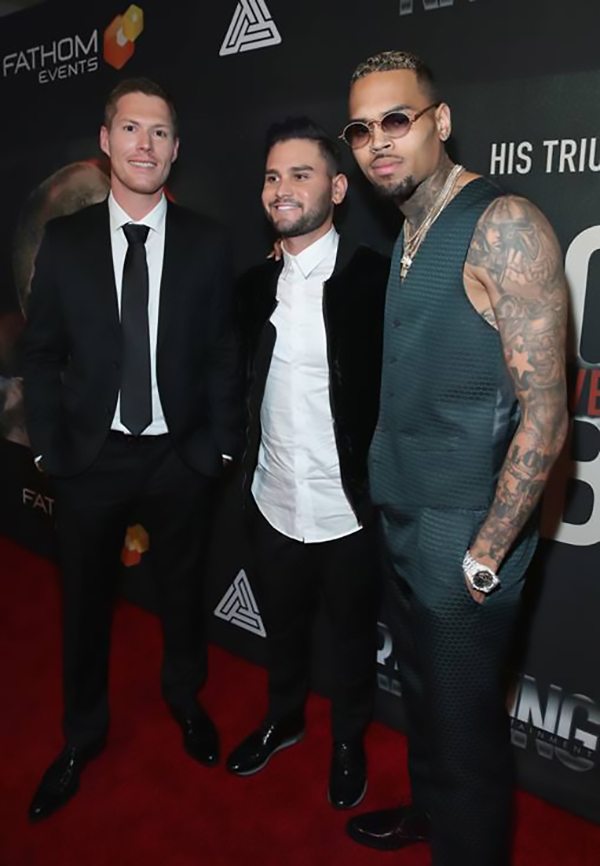 The men who made the film possible, Producer Andrew Listermann, Director Andrew Sandler and singer Chris Brown arrive at the Premiere of Riveting Entertainment's "Chris Brown: Welcome To My Life" at L.A. LIVE (Photo by Jonathan Leibson |Getty Images for Riveting Entertainment)