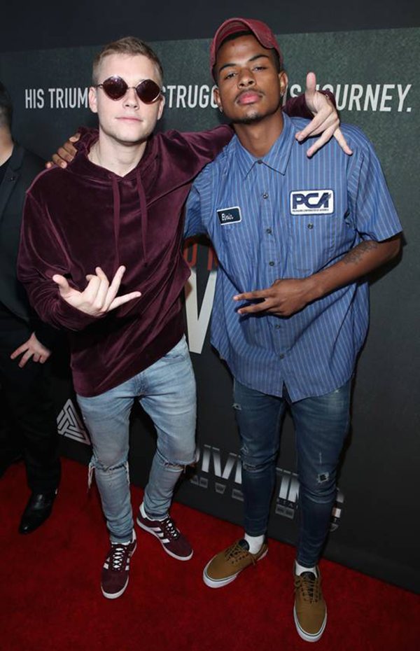 Musical artists Cal Scruby and pal Trevor Jackson, who came to the event together, pose for a quick photo on the carpet the Premiere of Riveting Entertainment's "Chris Brown: Welcome To My Life" at L.A. LIVE (Photo by Jonathan Leibson | Getty Images for Riveting Entertainment)