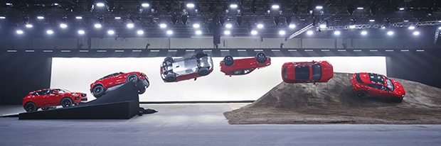 Jaguar and stunt driver Terry Grant set a new Guinness World Record for longest barrel roll at the global launch of the new Jaguar E-PACE at ExCel London. (Image composite)
