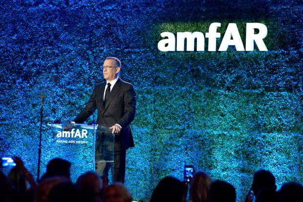 Actor Tom Hanks speaks onstage during the amfAR Gala 2017 at Ron Burkle's Green Acres Estate on October 13, 2017 in Beverly Hills, California. (Photo by Stefanie Keenan/Getty Images for Belvedere Vodka)