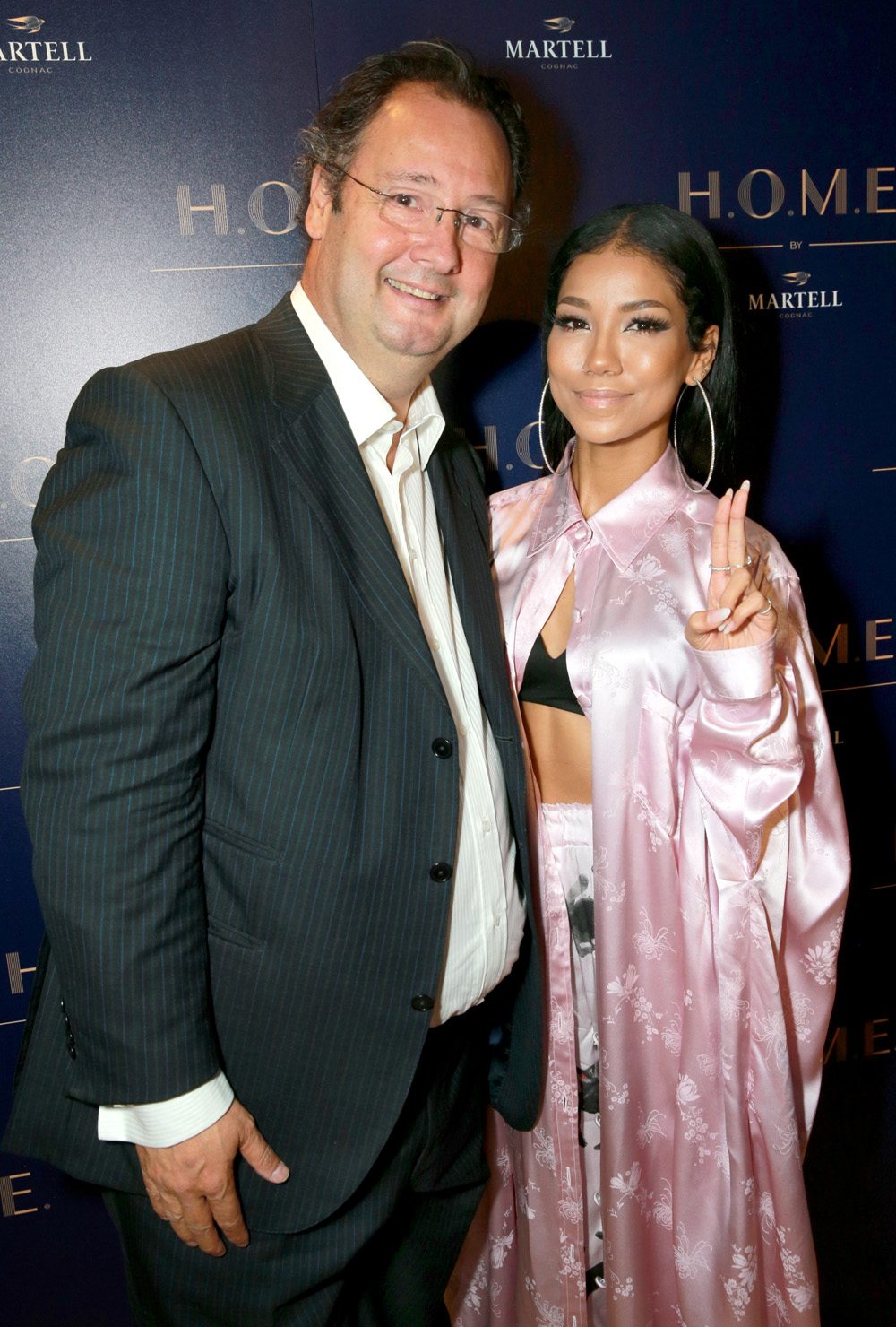 LOS ANGELES, CA - SEPTEMBER 28: Martell Mumm Perrier-Jouet CEO Cesar Giron and Jhené Aiko at H.O.M.E. by Martell hosted by Jhene Aiko on September 28, 2017 in Los Angeles, California. (Photo by Rich Fury/Getty Images for Martell)