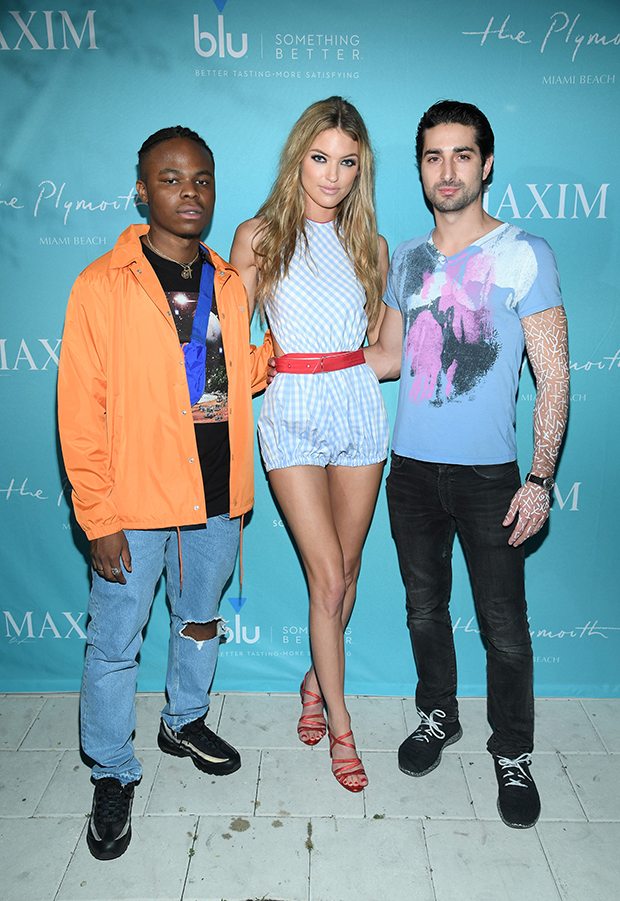 MIAMI BEACH, FL - DECEMBER 08: Daye Jack, Maxim cover model Martha Hunt and Marco Santini attend the Maxim December Miami Issue Party Presented by blu on December 8, 2017 in Miami Beach, Florida. (Photo by Dimitrios Kambouris/Getty Images for Maxim)