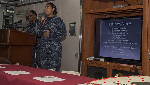 SOUTH CHINA SEA (Feb. 7, 2018) Aviation Machinist's Mate 1st Class Rhea Dias, from Mandeville, Jamaica, sings "Lift Every Voice" during an African American/Black History Month celebration on the mess decks of the amphibious assault ship USS Bonhomme Richard (LHD 6). Bonhomme Richard is operating in the Indo-Asia-Pacific region as part of a regularly scheduled patrol and provides a rapid-response capability in the event of a regional contingency or natural disaster. (U.S. Navy photo by Mass Communication Specialist 2nd Class Kyle Carlstrom/Released)