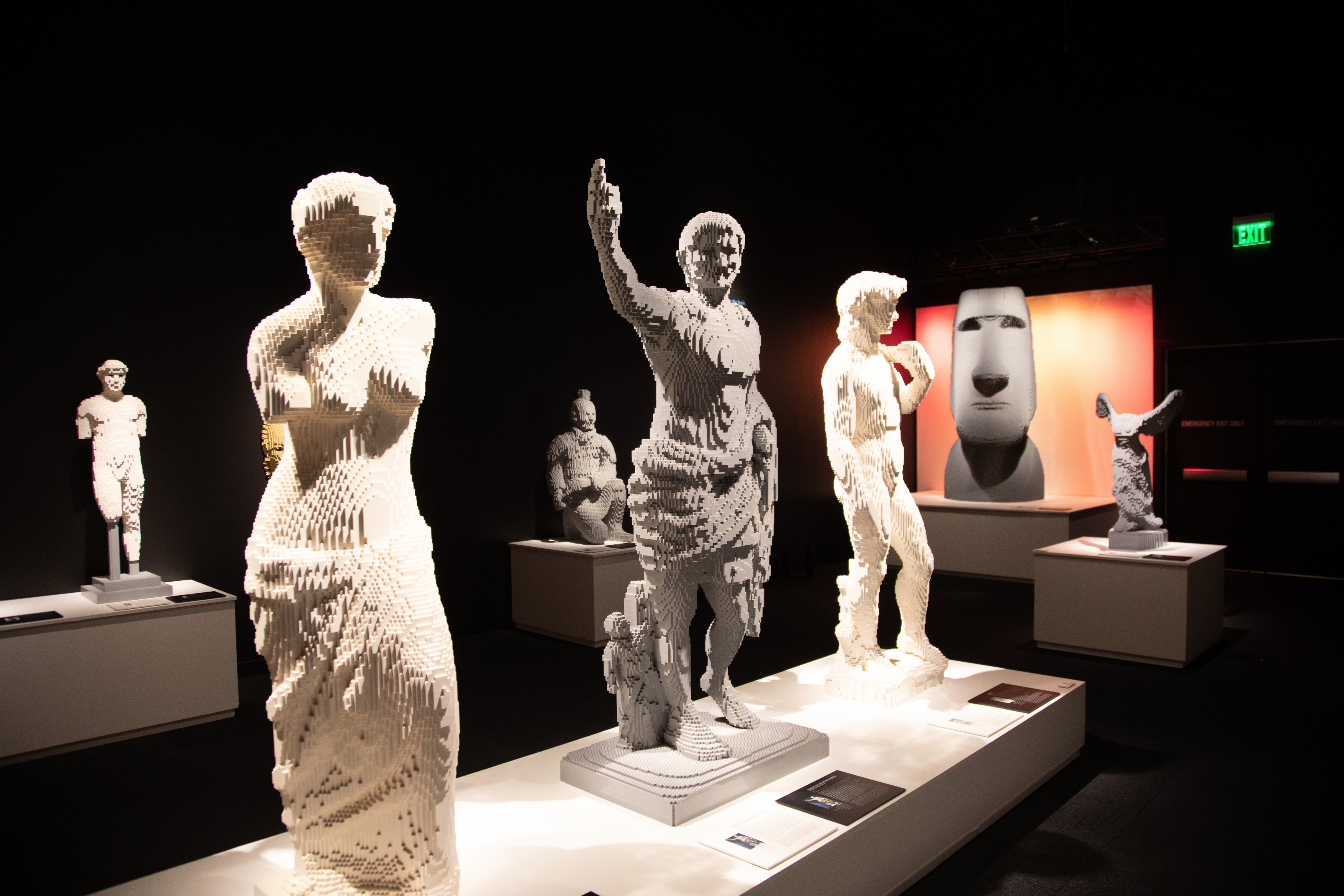 Alexandros of Antioch’s Venus de Milo, Augustus of Prima Porta, and Michelangelo’s David take center stage in the art history gallery of The Art of the Brick traveling exhibition (PHOTO CREDIT: JerSean Golatt/Perot Museum of Nature and Science)