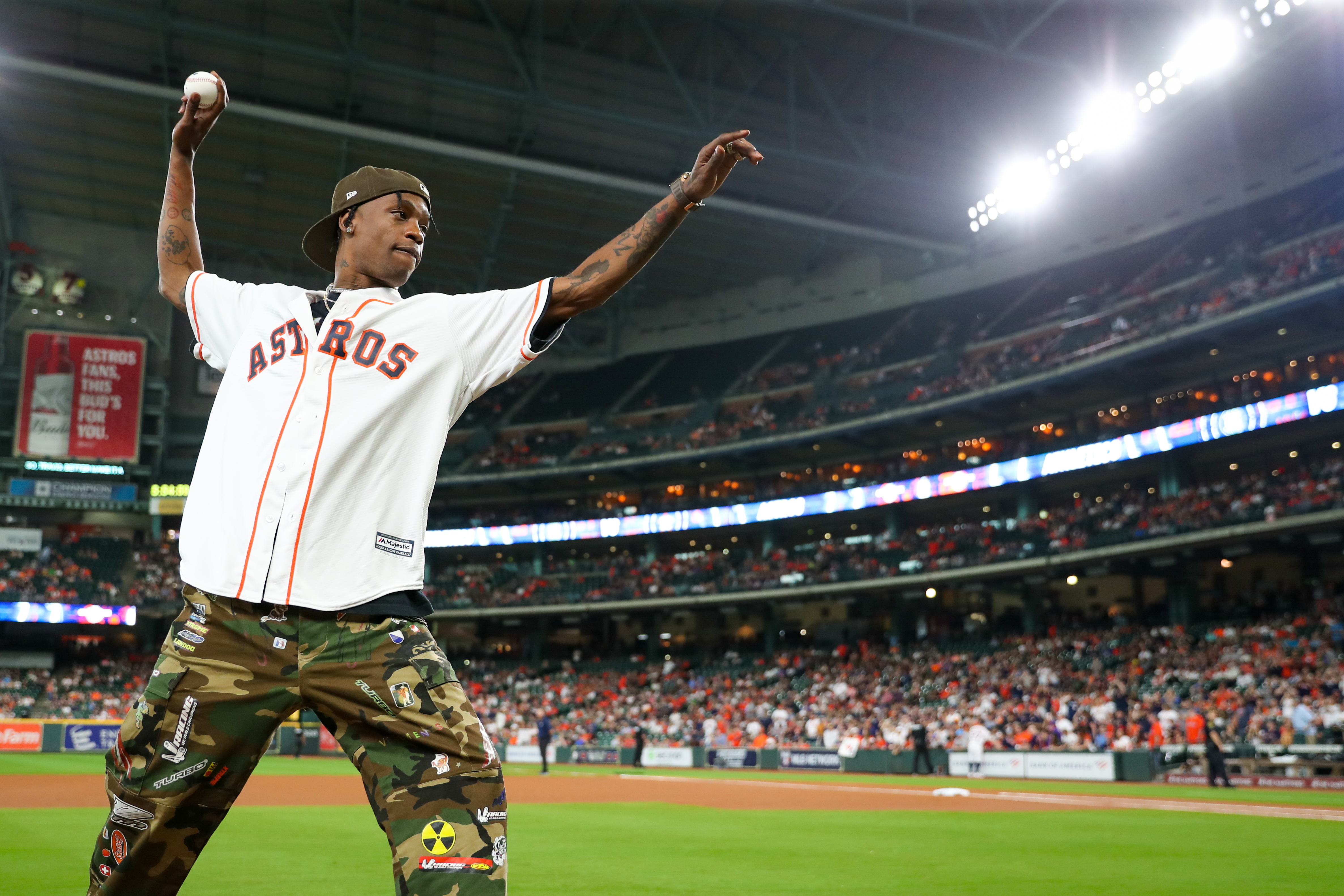 Travis Scott threw out the ceremonial first pitch at Minute Maid Park to  commemorate his Astros/New Era collaboration - The Hype Magazine