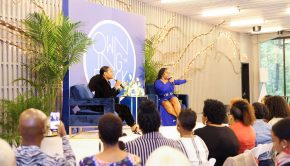 Celebrity event producer, Karleen Roy and Entrepreneur, Myleik Teele address the Owning the Block crowd