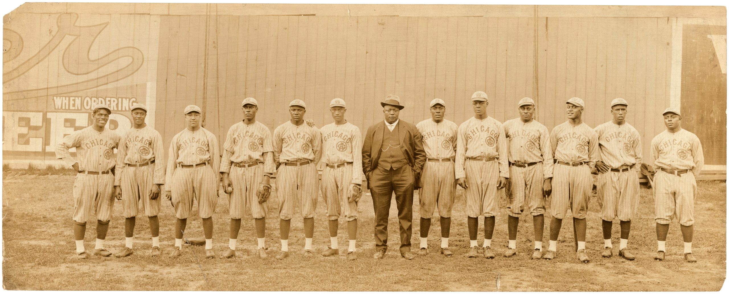 Rube Foster (center) while managing the 1916 Chicago American Giants, from THE LEAGUE, a Magnolia Pictures release. © Hake’s Auction. Photo courtesy of Magnolia Pictures.
