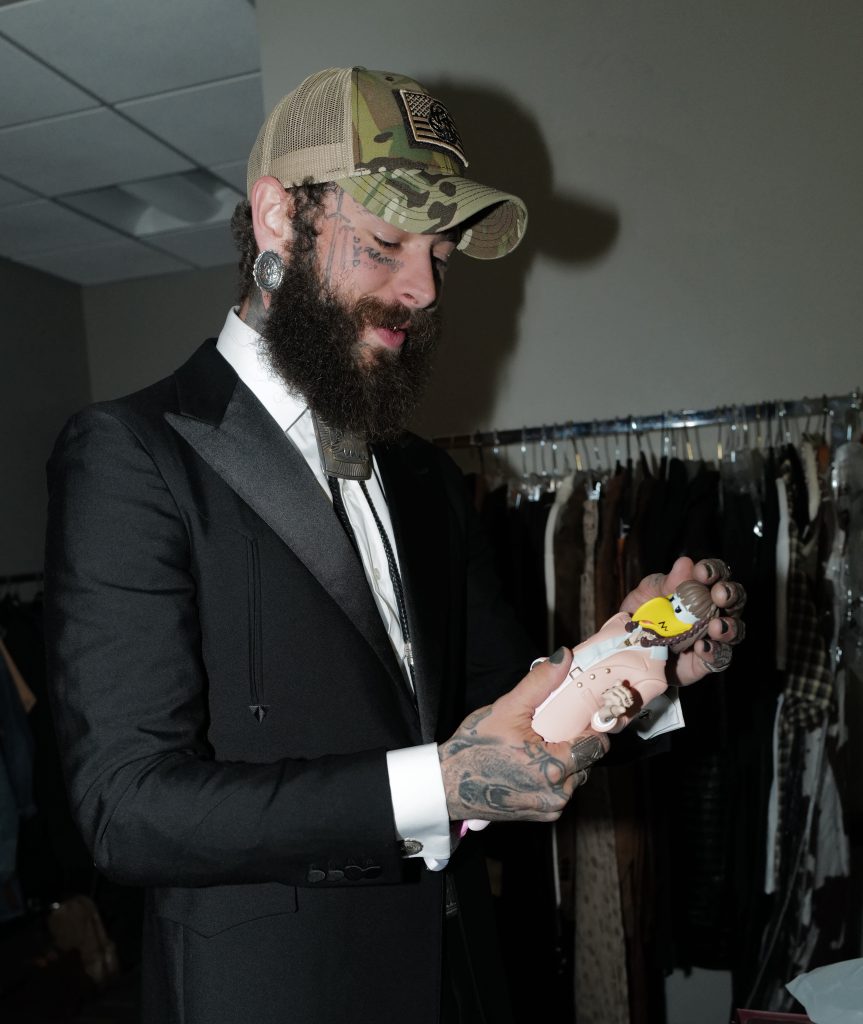 Post Malone with "Legend of Malone" figurine by Superplastic