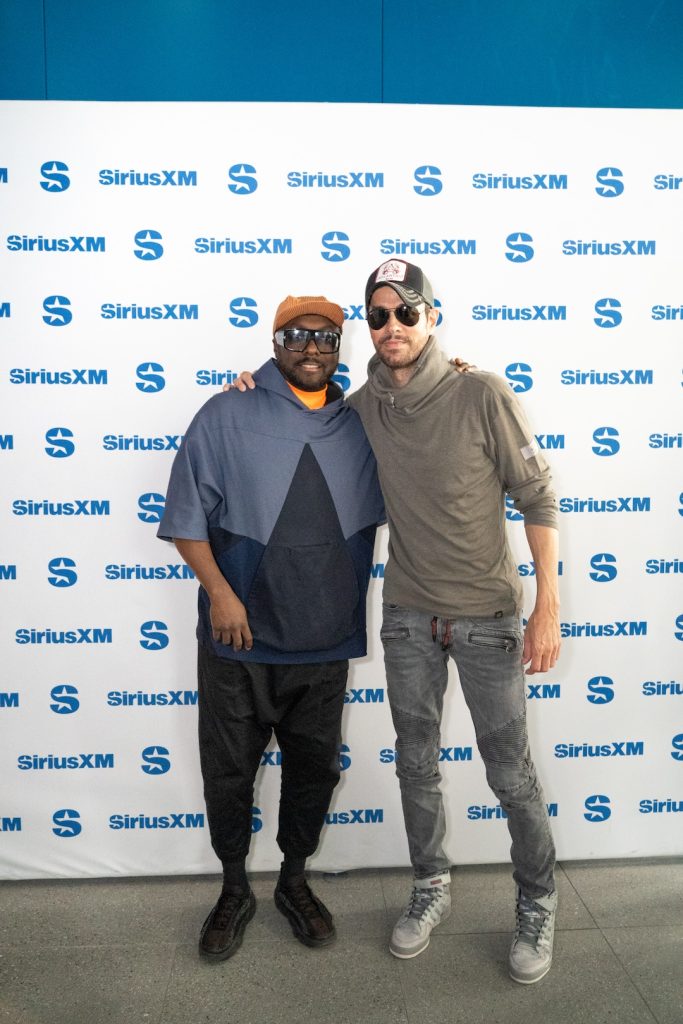 will.i.am records his SiriusXM show “will.i.am Presents the FYI Show” with Enrique Iglesias from the SiriusXM Miami Studios during F1 Miami Weekend - Photo Credit April Nicole/SiriusXM
